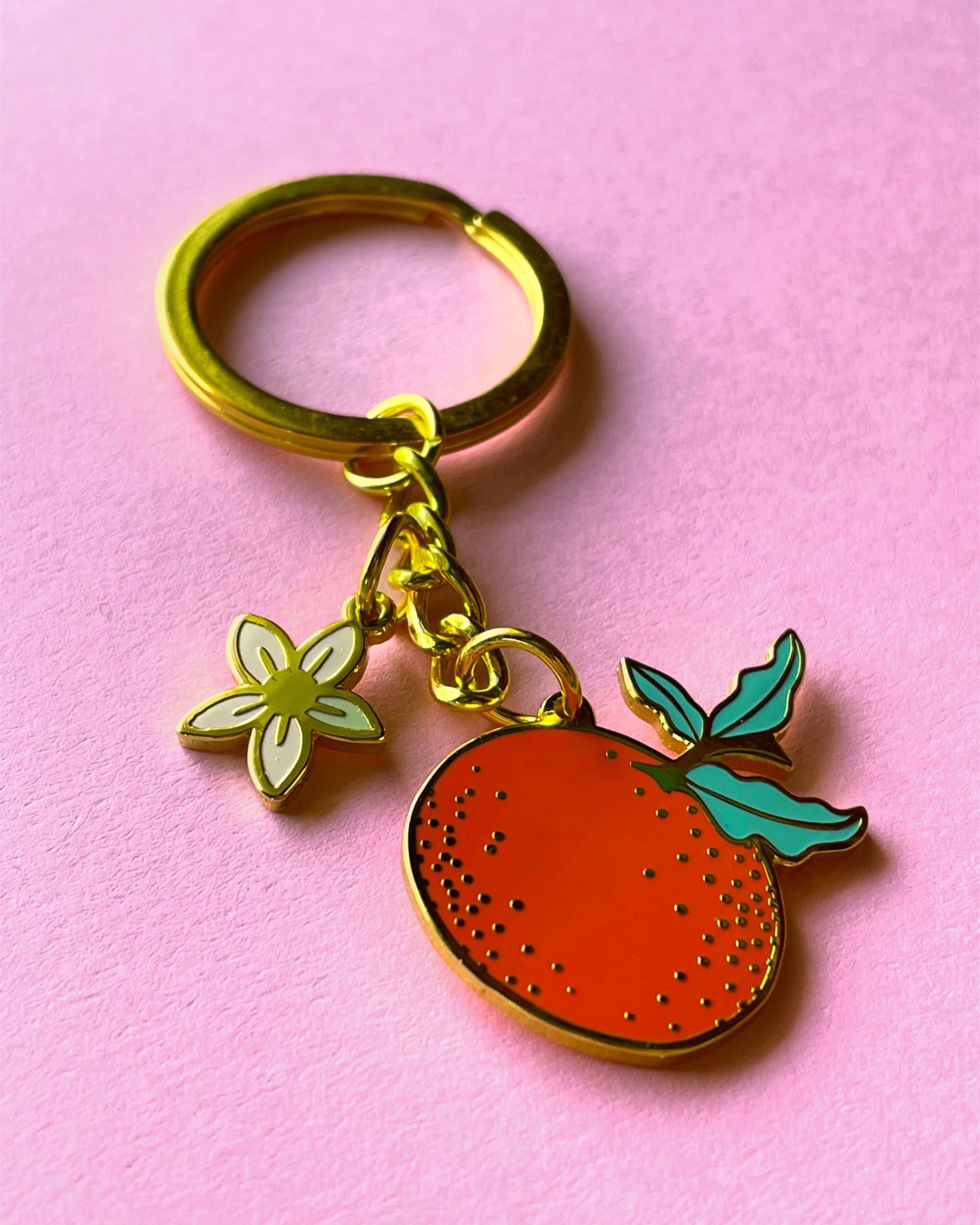 Kate Soade orange blossom store keychain